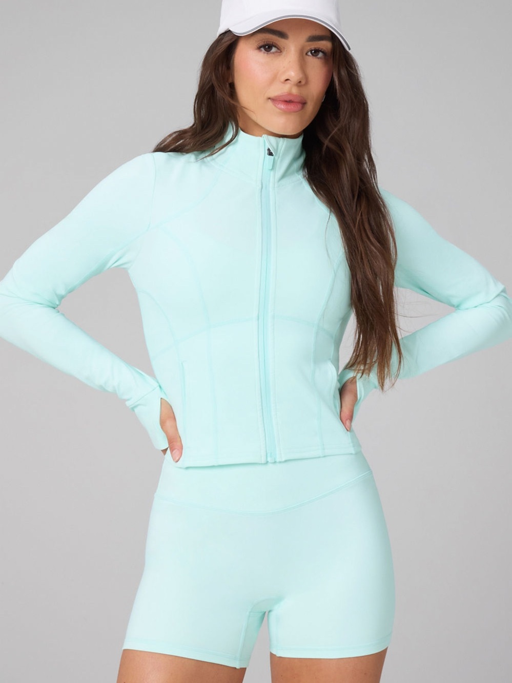 Fabletics Perfect Storm Cropped Train Jacket in Aqua